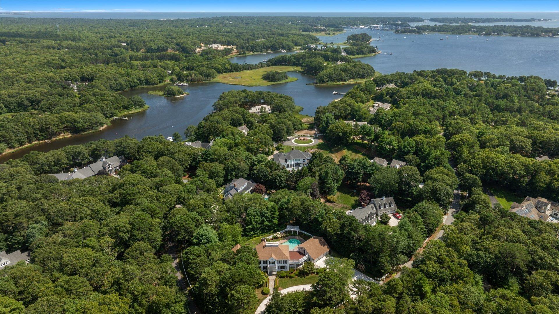 431 Baxter Neck Road Marstons Mills, MA 02648 - Photo 3 of 30 an aerial view of lake residential houses with outdoor space and trees