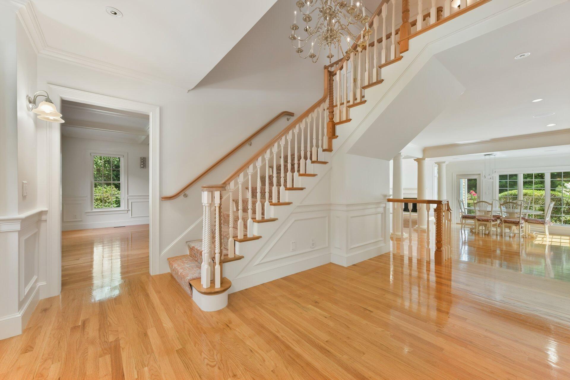 431 Baxter Neck Road Marstons Mills, MA 02648 - Photo 4 of 30 a view of entryway and hall with wooden floor