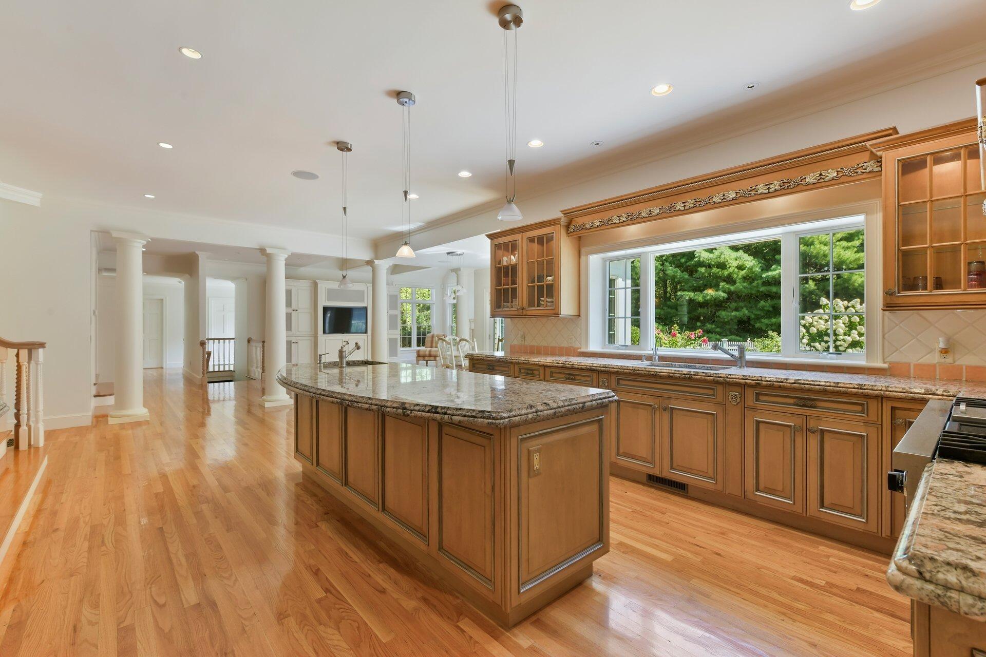 431 Baxter Neck Road Marstons Mills, MA 02648 - Photo 7 of 30 a large kitchen with lots of counter space and a sink