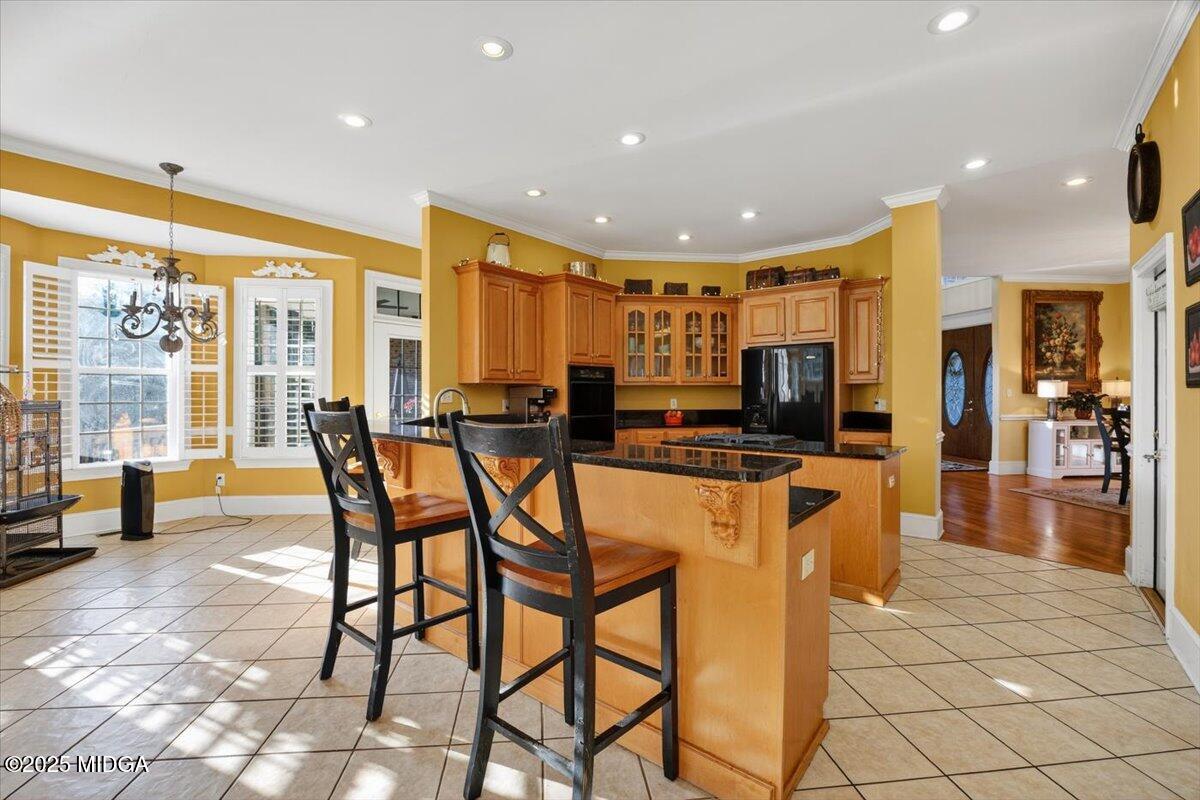 176 Tumbling Shoals Drive Gray, GA 31032 - Photo 11 of 52 a view of a dining room with furniture