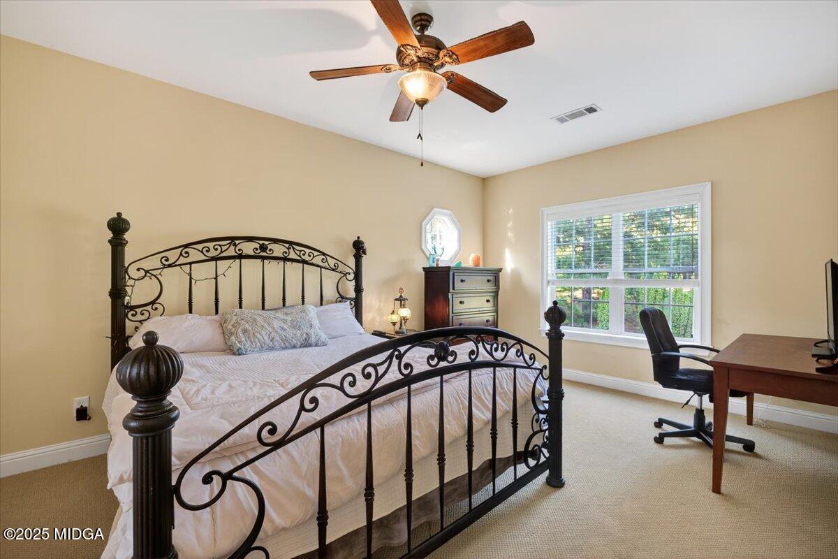 176 Tumbling Shoals Drive Gray, GA 31032 - Photo 28 of 52 a bedroom with furniture and a window