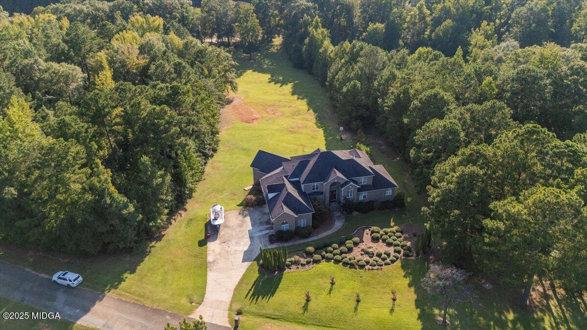 176 Tumbling Shoals Drive Gray, GA 31032 - Photo 43 of 52 a view of a house with a yard