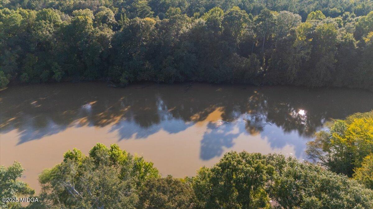 176 Tumbling Shoals Drive Gray, GA 31032 - Photo 45 of 52 a view of a lake from a yard