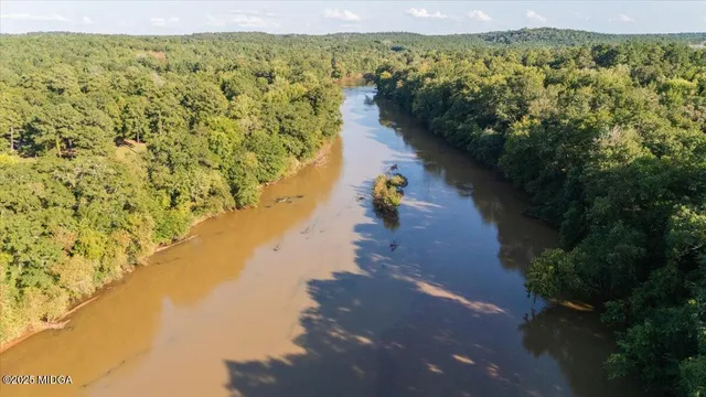 a view of a lake with mountains in the background