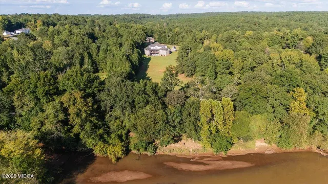 a view of a lake from a yard