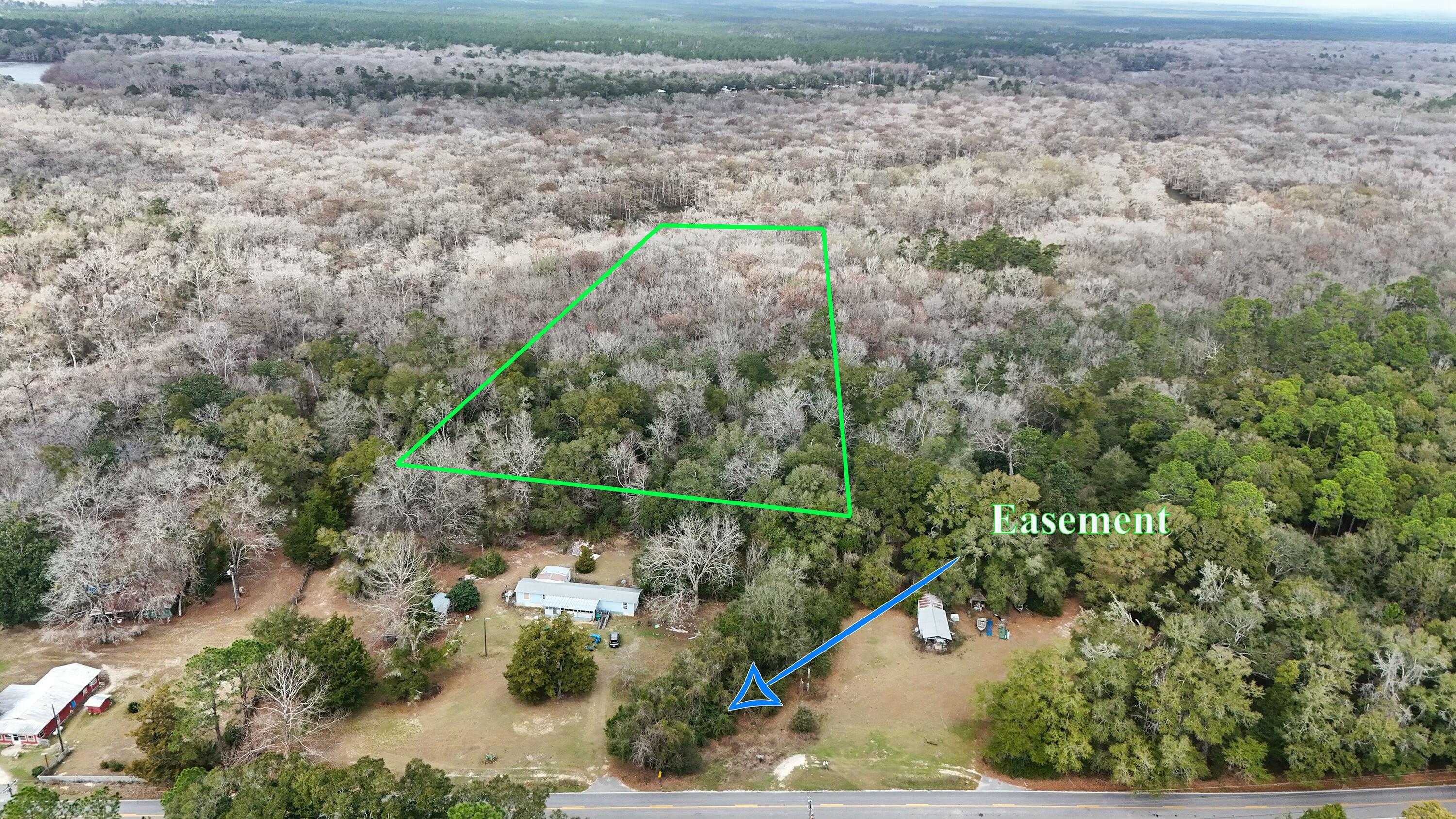 Tbd Strickland Road Ebro, FL 32437 - Photo 28 of 36 a view of a houses of a yard