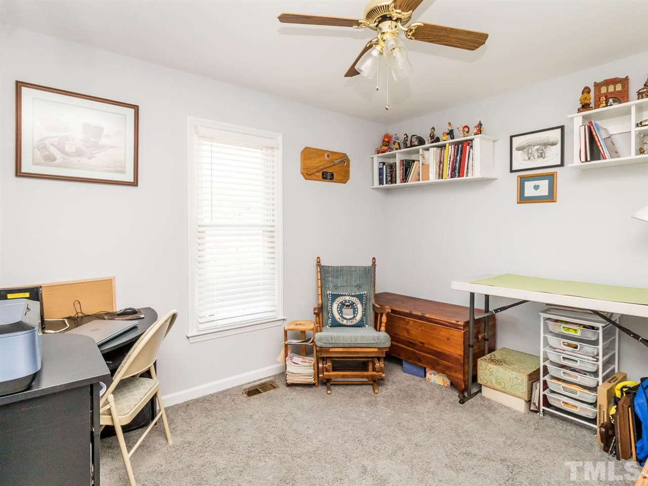 10017 Joe Leach Road Raleigh, NC 27603 - Photo 11 of 23 a living room with furniture and a window