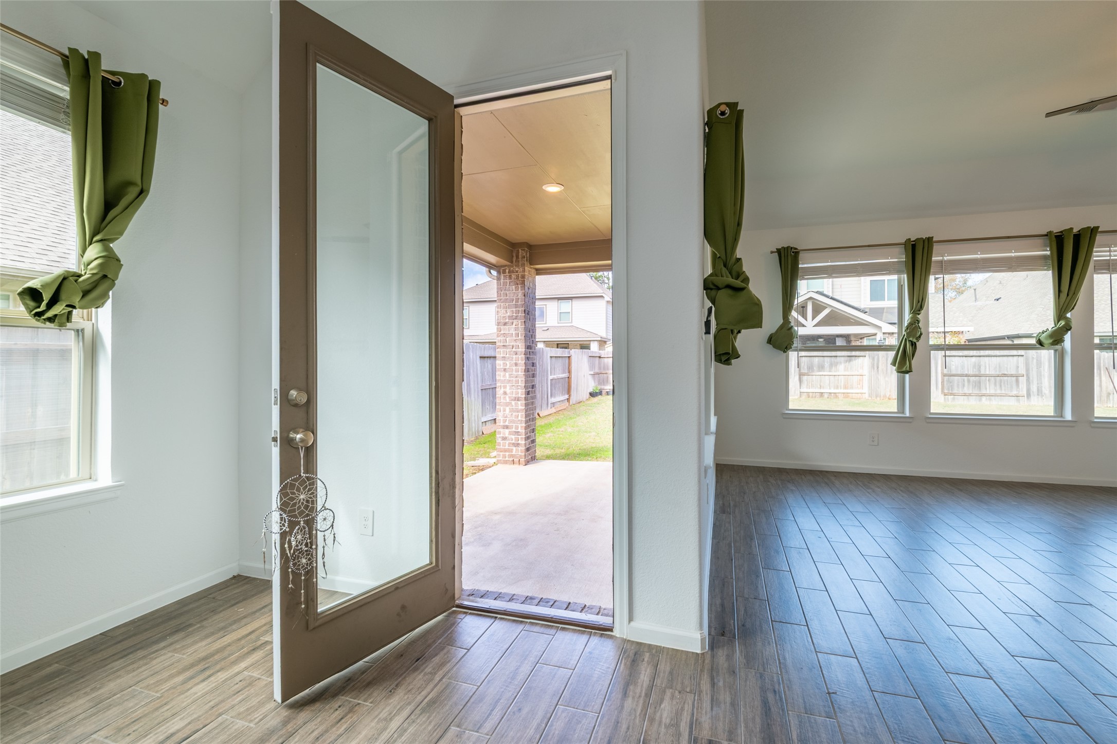 15023 Mulberry Hallow Street Conroe, TX 77302 - Photo 14 of 41 a view of an entryway with wooden floor and door