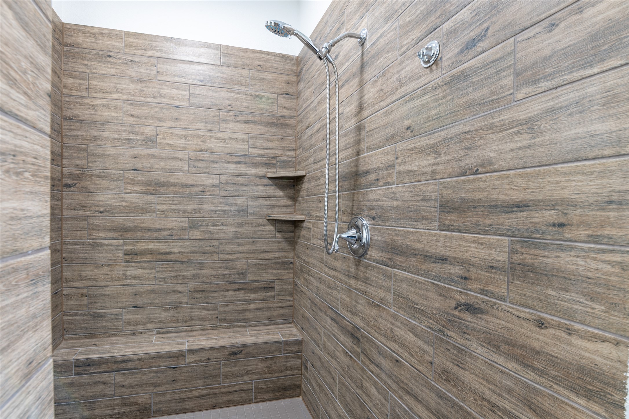 15023 Mulberry Hallow Street Conroe, TX 77302 - Photo 24 of 41 a bathroom with a shower