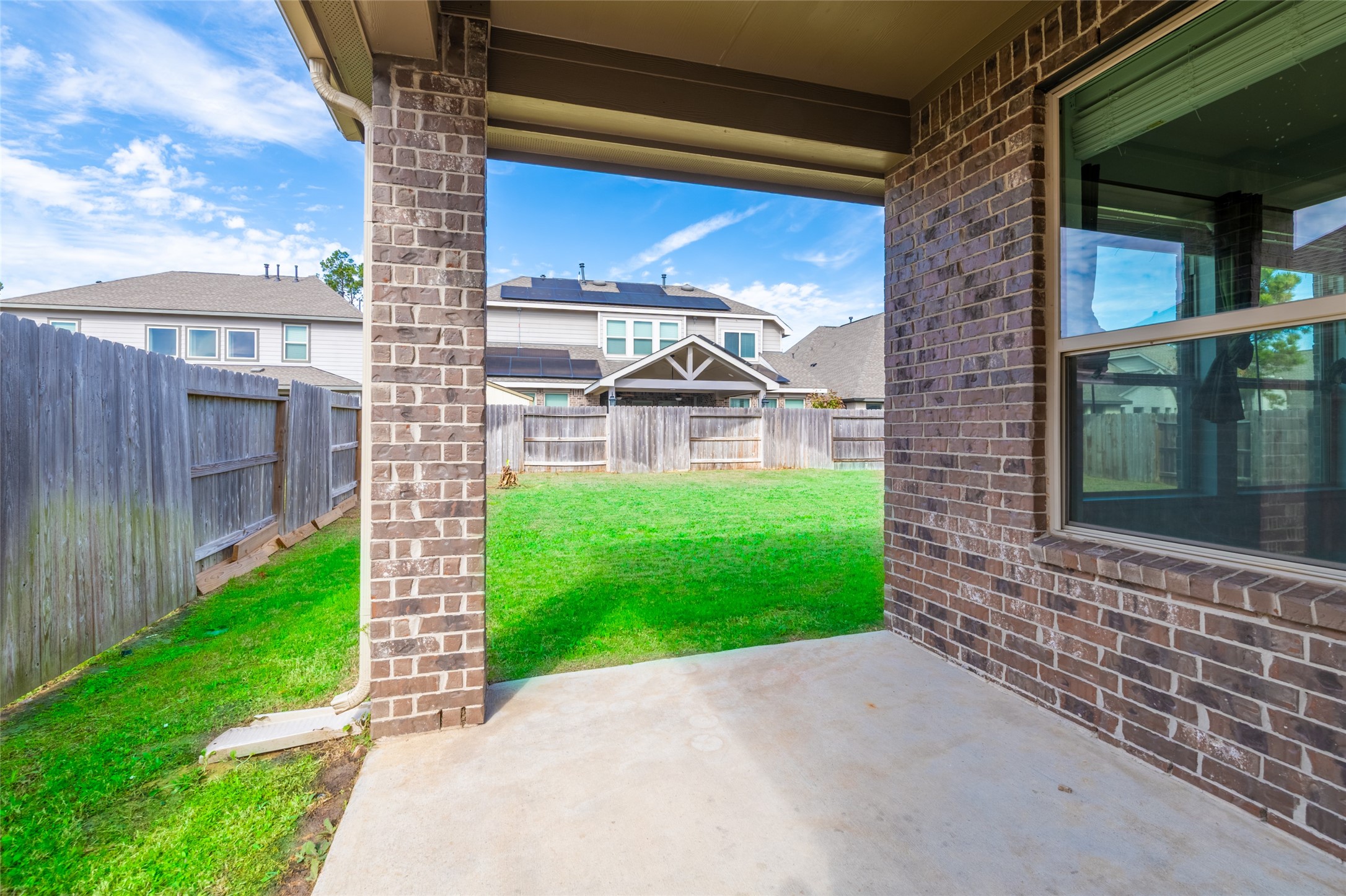 15023 Mulberry Hallow Street Conroe, TX 77302 - Photo 35 of 41 a view of a door with a porch