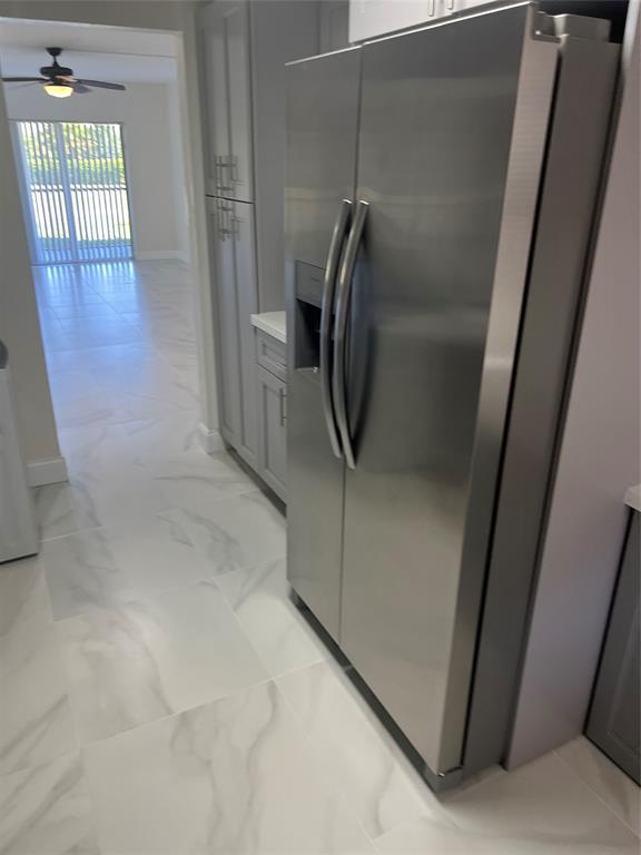 8705 Northwest 38th Drive, Unit 2A Coral Springs, FL 33065 - Photo 12 of 51 a view of a bathroom from a hallway