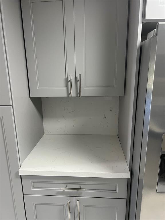 8705 Northwest 38th Drive, Unit 2A Coral Springs, FL 33065 - Photo 17 of 51 a close view of cabinet