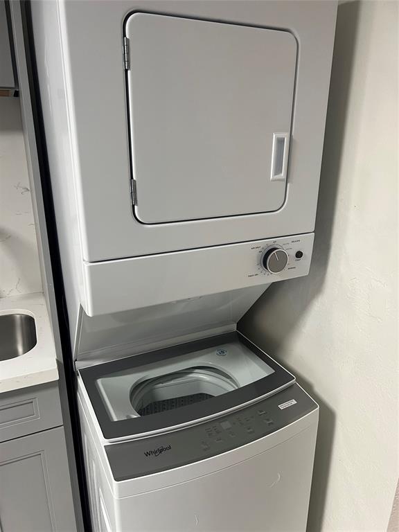8705 Northwest 38th Drive, Unit 2A Coral Springs, FL 33065 - Photo 18 of 51 a utility room with dryer and washer