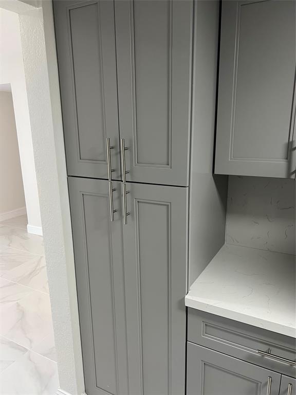 8705 Northwest 38th Drive, Unit 2A Coral Springs, FL 33065 - Photo 34 of 51 a close view of wooden cabinets