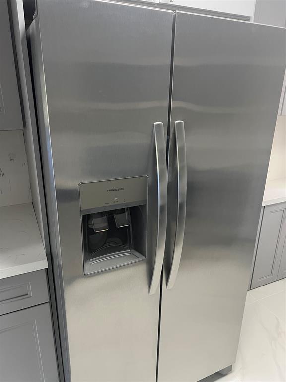 8705 Northwest 38th Drive, Unit 2A Coral Springs, FL 33065 - Photo 35 of 51 a close view of refrigerator