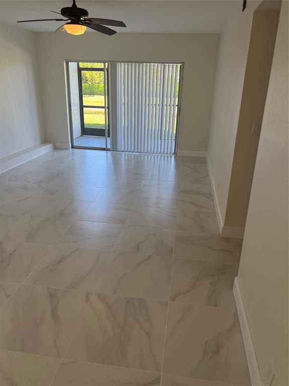 8705 Northwest 38th Drive, Unit 2A Coral Springs, FL 33065 - Photo 37 of 51 a view of an empty room and a window