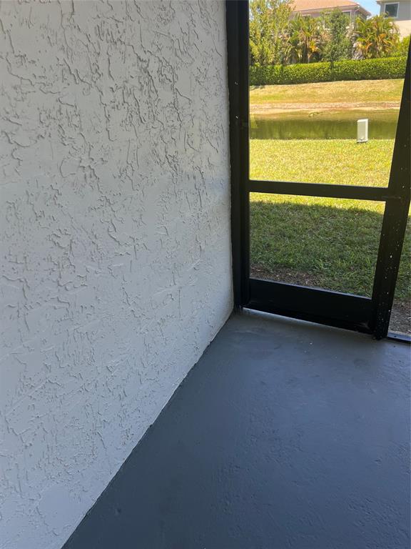 8705 Northwest 38th Drive, Unit 2A Coral Springs, FL 33065 - Photo 49 of 51 a view of an empty room and a window