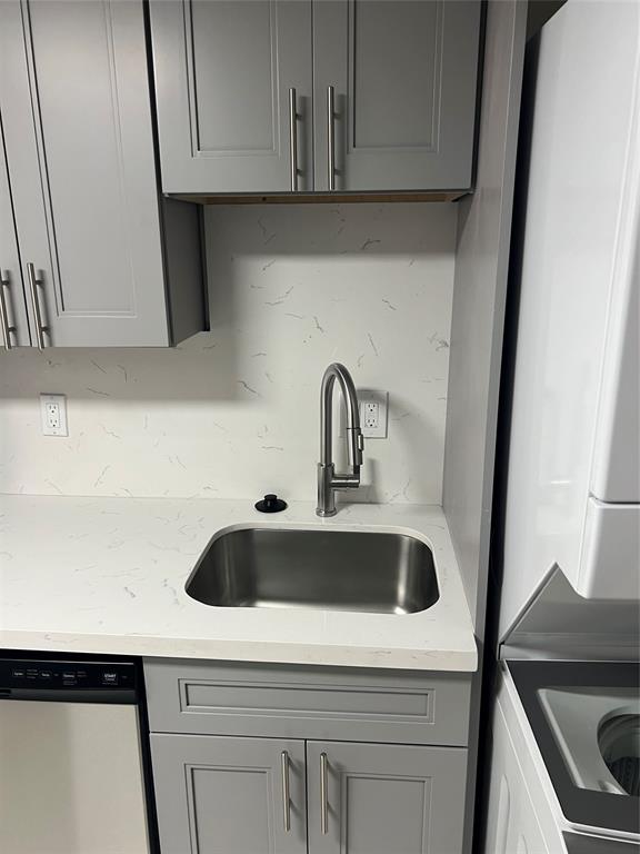 8705 Northwest 38th Drive, Unit 2A Coral Springs, FL 33065 - Photo 5 of 51 a kitchen with a sink and cabinets