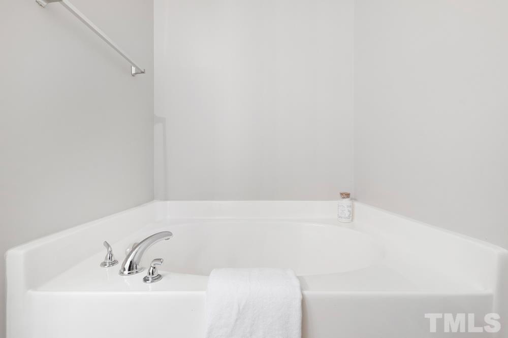 2520 Follow Me Way Raleigh, NC 27610 - Photo 14 of 30 a bathroom with a bathtub