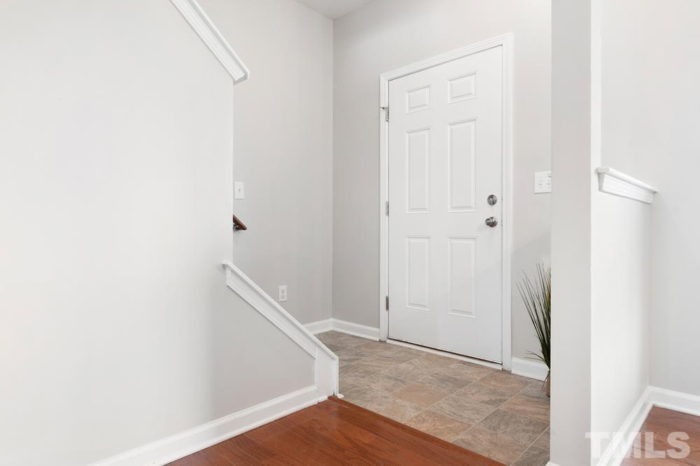 2520 Follow Me Way Raleigh, NC 27610 - Photo 3 of 30 a view of entryway with wooden floor