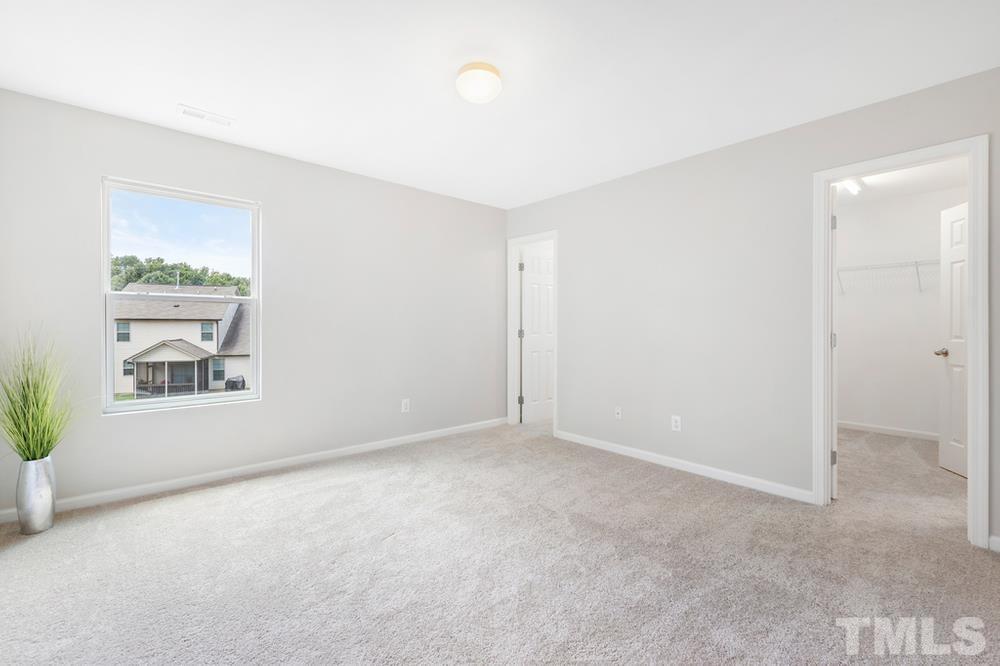 2520 Follow Me Way Raleigh, NC 27610 - Photo 23 of 30 a view of an empty room with a window