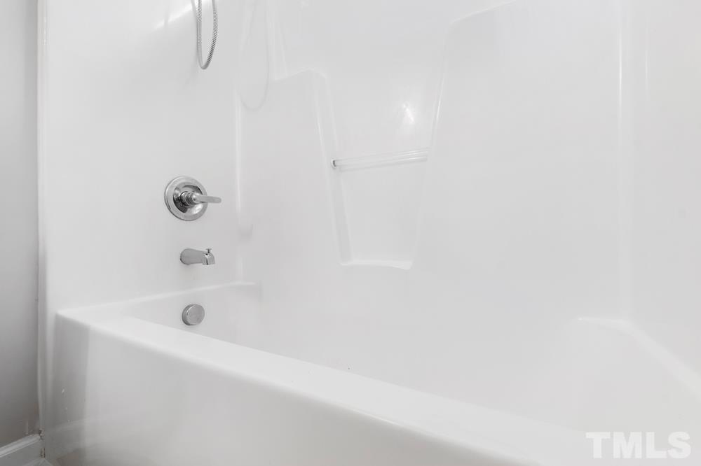 2520 Follow Me Way Raleigh, NC 27610 - Photo 25 of 30 a bathroom with a bathtub