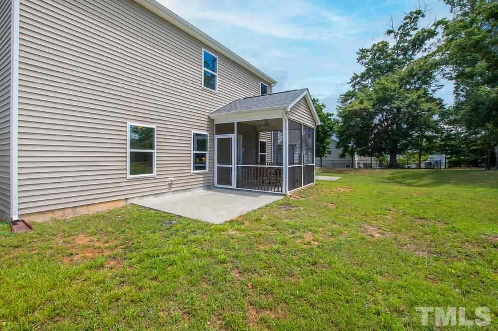 2520 Follow Me Way Raleigh, NC 27610 - Photo 27 of 30 a view of a house with a backyard