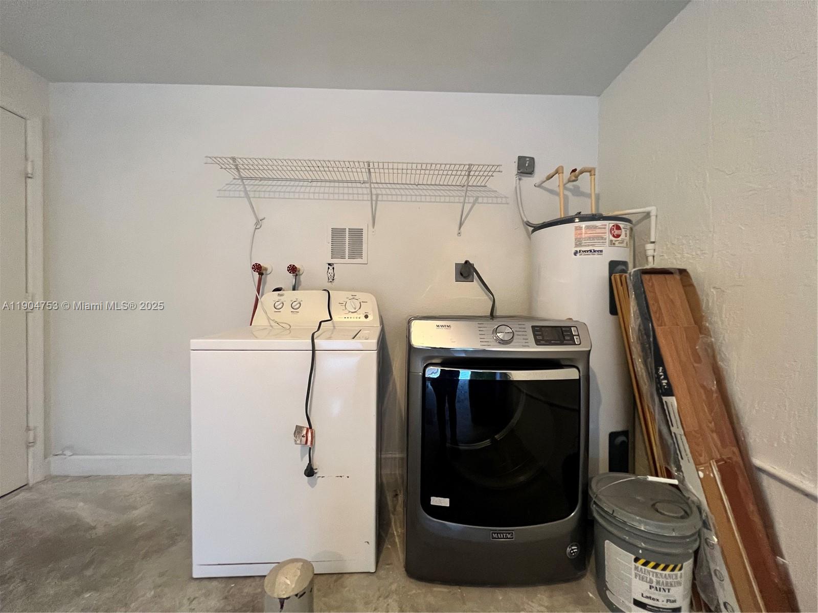 8564 Southwest 214th Way Cutler Bay, FL 33189 - Photo 3 of 31 a utility room with dryer and washer