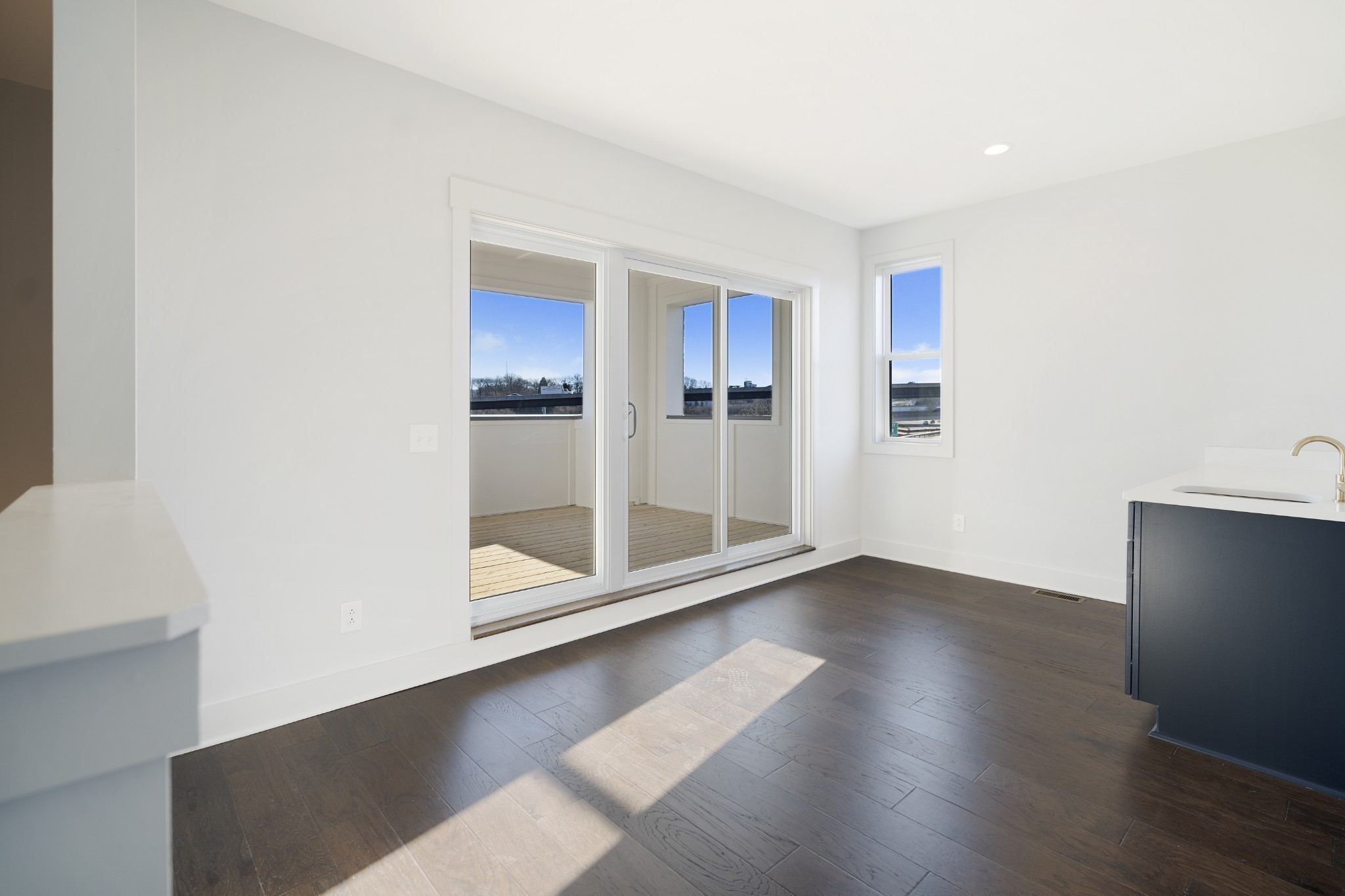 710 Inspiration Boulevard Madison, TN 37115 - Photo 25 of 43 a view of an empty room with wooden floor and a window