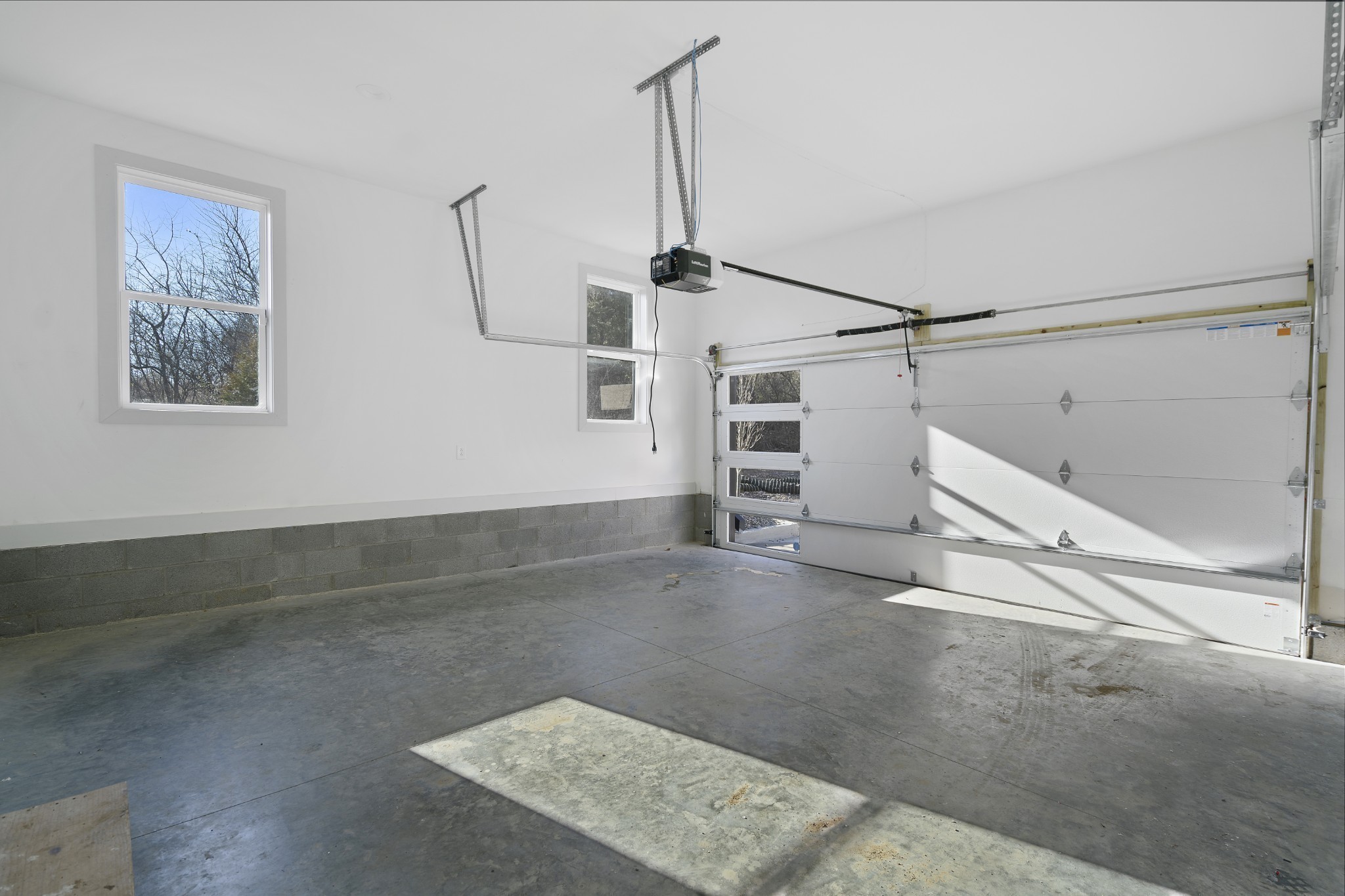 710 Inspiration Boulevard Madison, TN 37115 - Photo 40 of 43 a view of a room with stairs and a floor to ceiling window