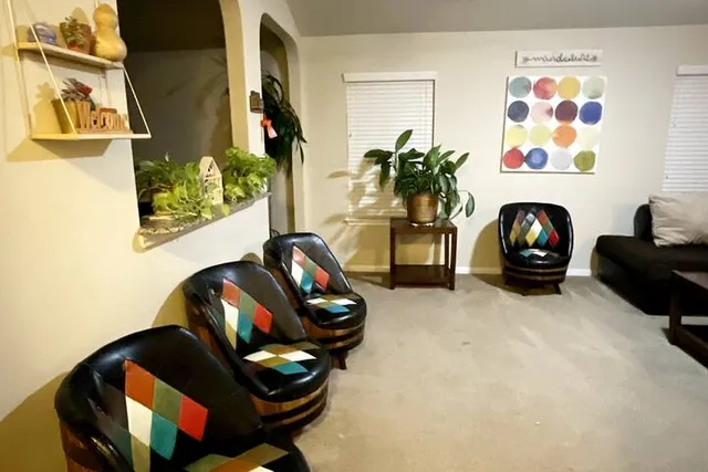 a living room with furniture and decor