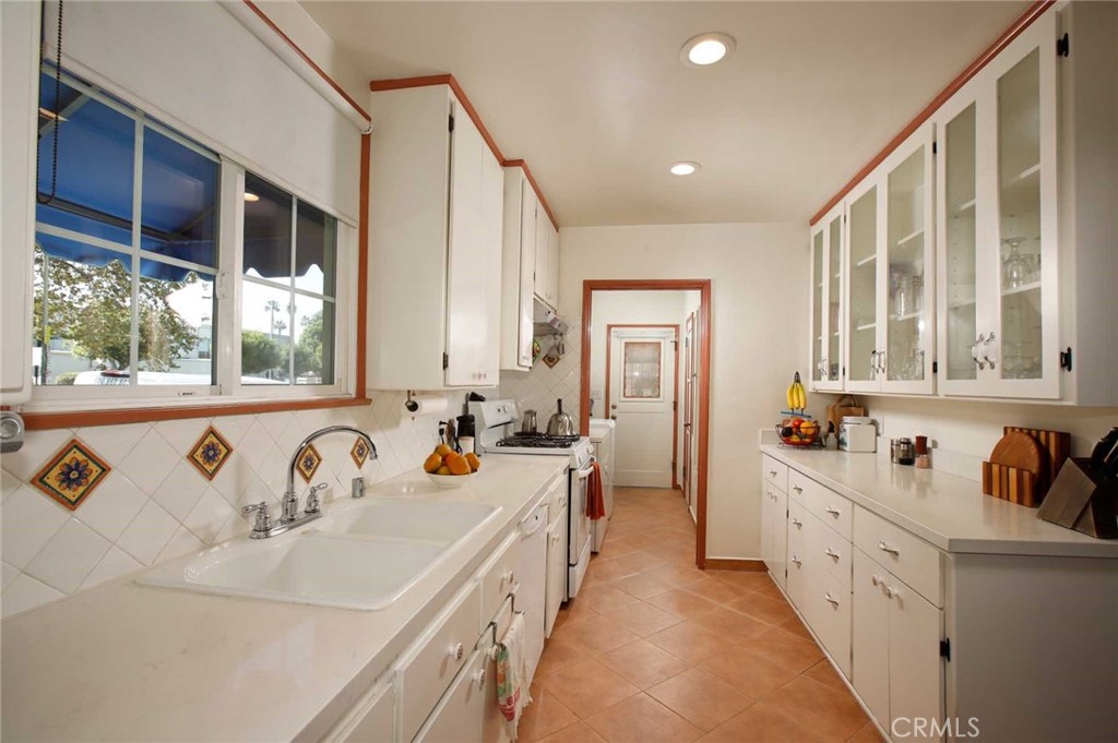 6903 Halbrent Avenue Van Nuys, CA 91405 - Photo 6 of 10 a bathroom with a sink and a bathtub