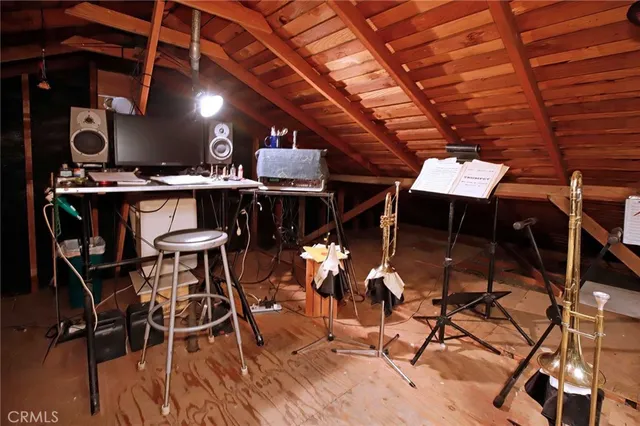 a view of a chairs and table in a patio