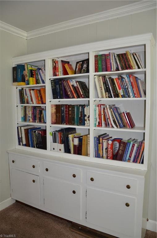 1072 Cantering Road High Point, NC 27262 - Photo 12 of 28 Built-In Shelving in Den, so beautiful!