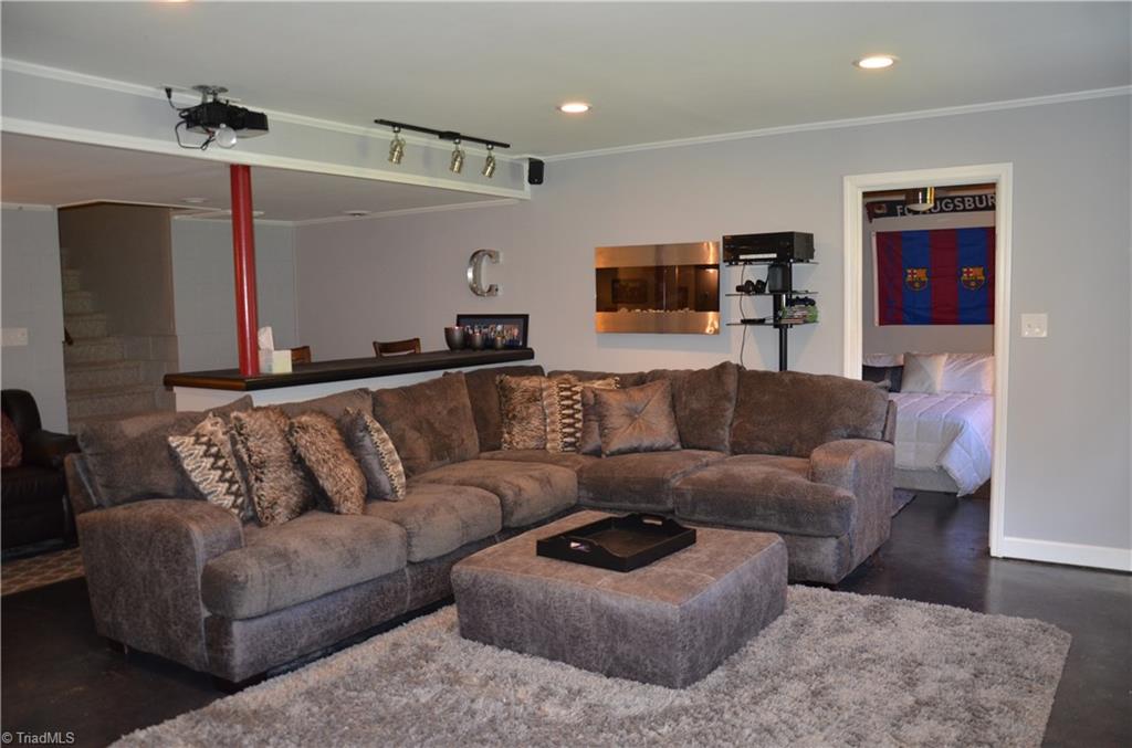 1072 Cantering Road High Point, NC 27262 - Photo 16 of 28 Dreamed of having an amazing basement?? This is it! Bar Seating Area, Separate Room, Full Bath, & More!