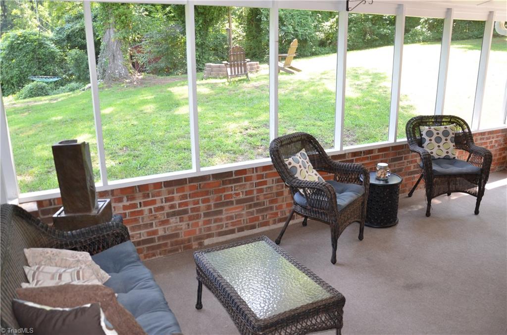 1072 Cantering Road High Point, NC 27262 - Photo 17 of 28 Enjoy the backyard while relaxing in the Screened in Porch...