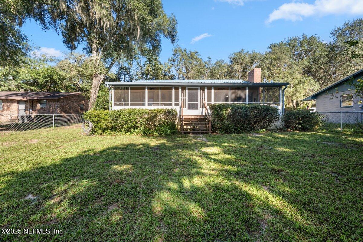 832 Lake Shore Terrace Interlachen, FL 32148 - Photo 23 of 42 a view of a house with a yard