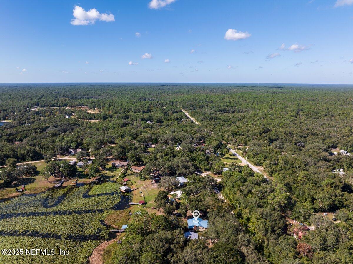 832 Lake Shore Terrace Interlachen, FL 32148 - Photo 40 of 42 an aerial view of a houses with a yard