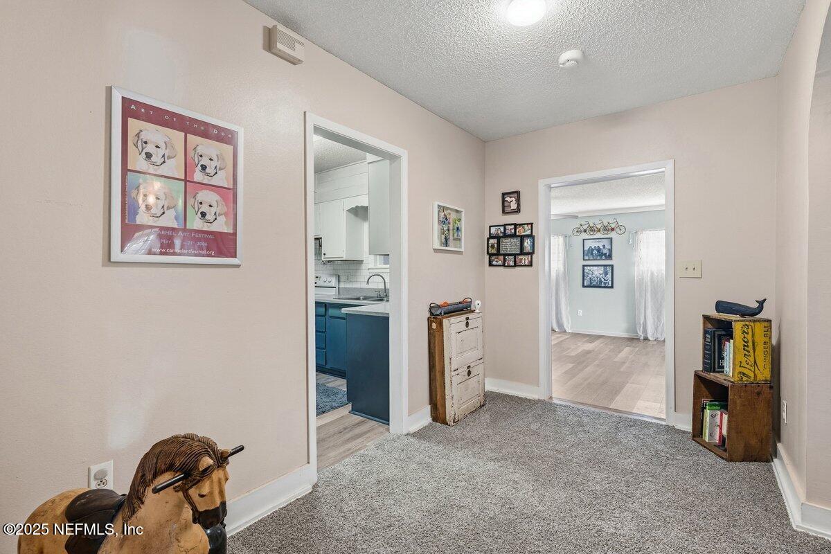 832 Lake Shore Terrace Interlachen, FL 32148 - Photo 7 of 42 a view of a workspace with furniture and closet