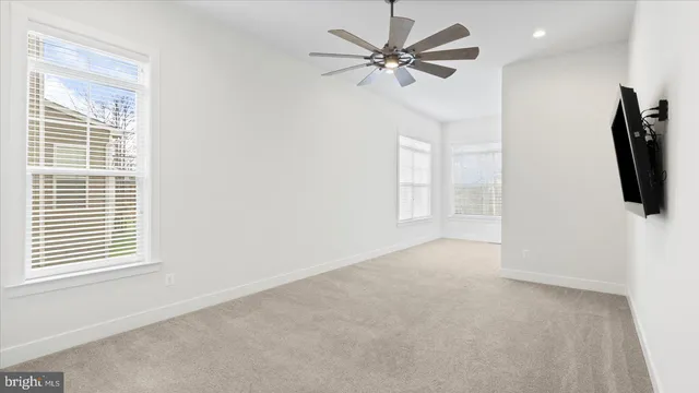 a view of a livingroom with a flat screen tv