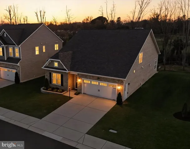a view of a street with brick house
