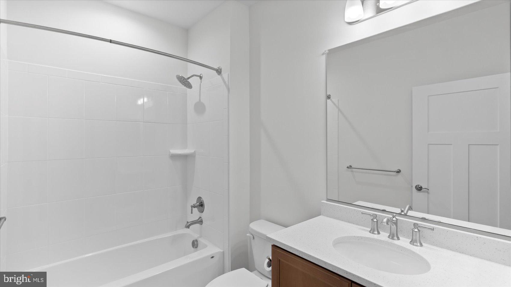 2510 Easy Street Fallston, MD 21047 - Photo 22 of 56 a bathroom with a granite countertop sink a toilet and shower