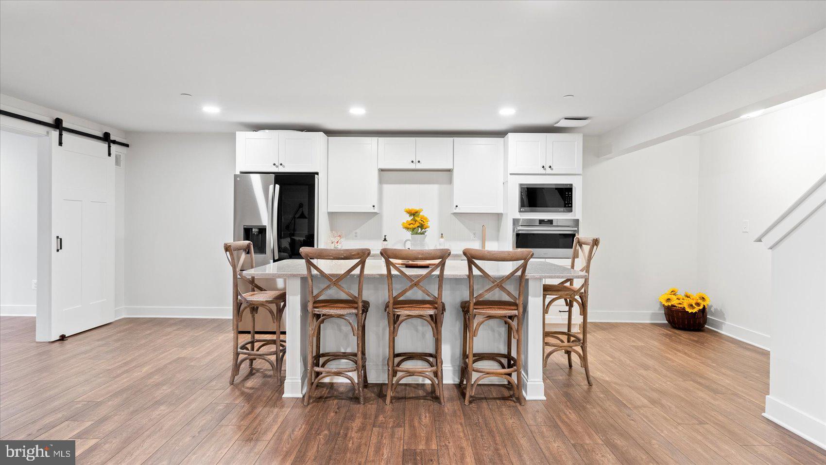 2510 Easy Street Fallston, MD 21047 - Photo 34 of 56 a view of a dining room with furniture and wooden floor