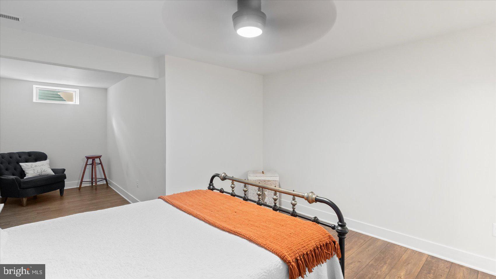 2510 Easy Street Fallston, MD 21047 - Photo 37 of 56 a bedroom with a bed and a chandelier