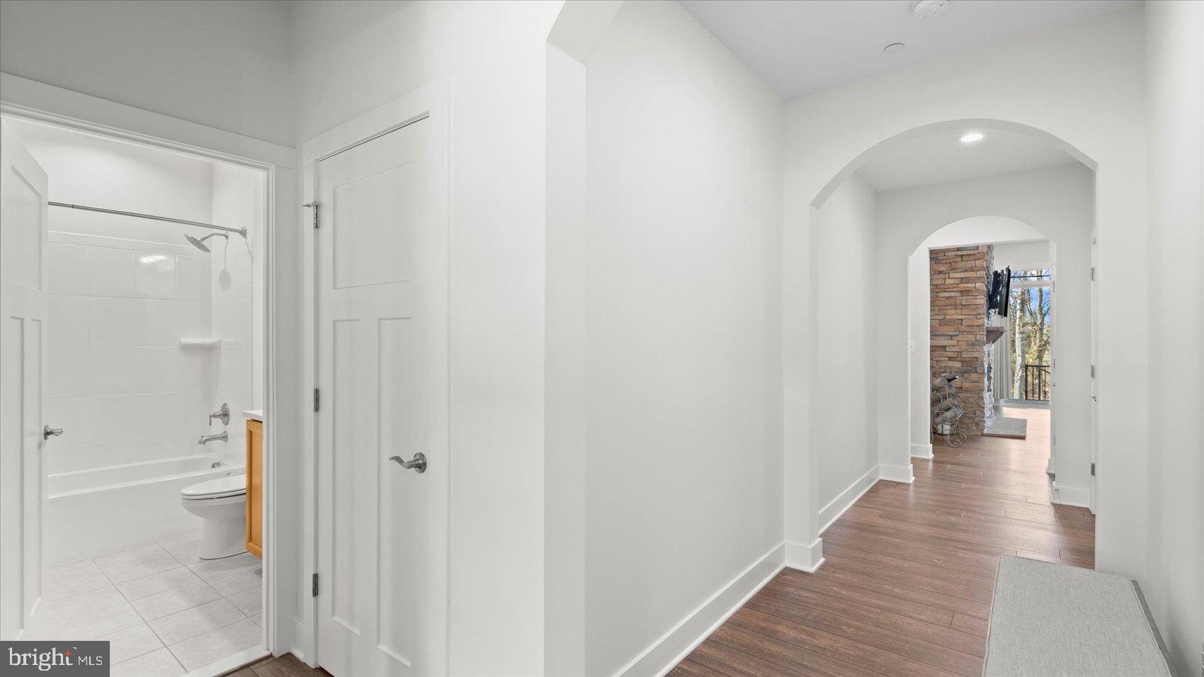 2510 Easy Street Fallston, MD 21047 - Photo 6 of 56 a view of a hallway with wooden floor and a bathroom
