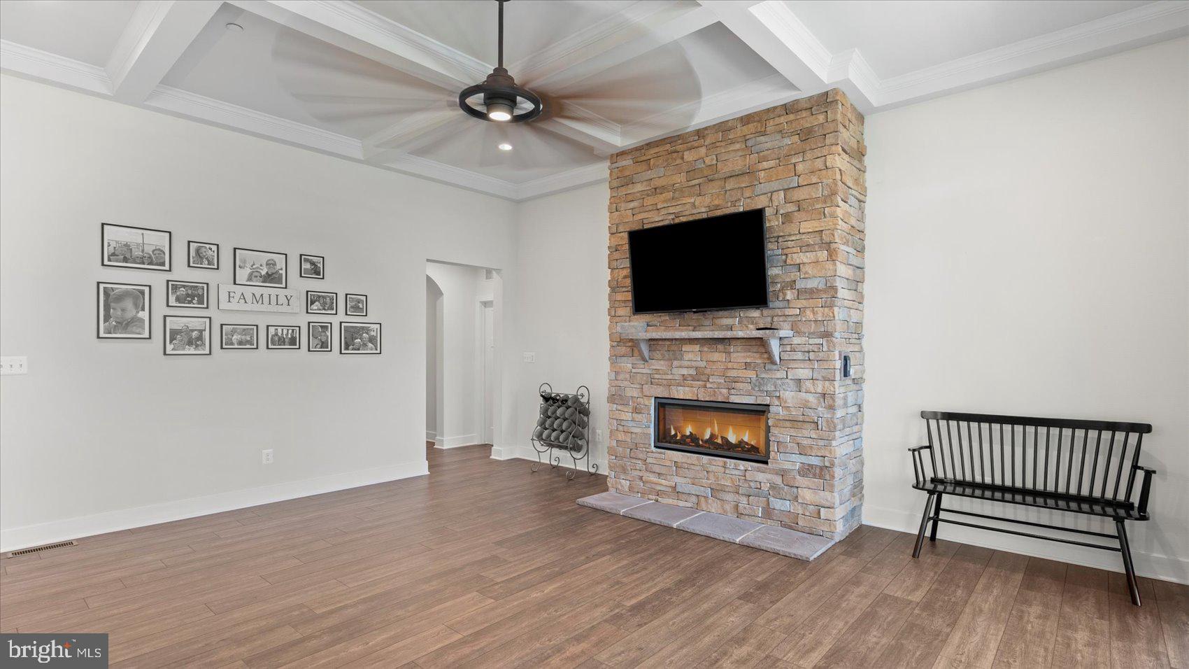 2510 Easy Street Fallston, MD 21047 - Photo 8 of 56 an empty room with fireplace wooden floor and windows