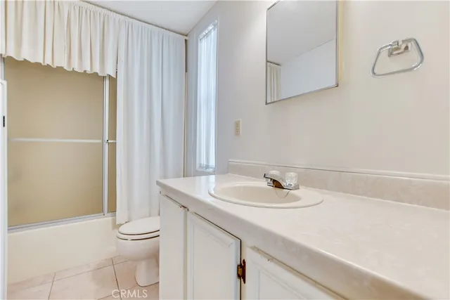 a view of a house with a street