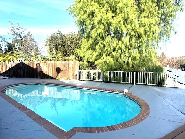 4223 Ridge Drive Pittsburg, CA 94565 - Photo 12 of 14 a view of a swimming pool with a patio and fire pit