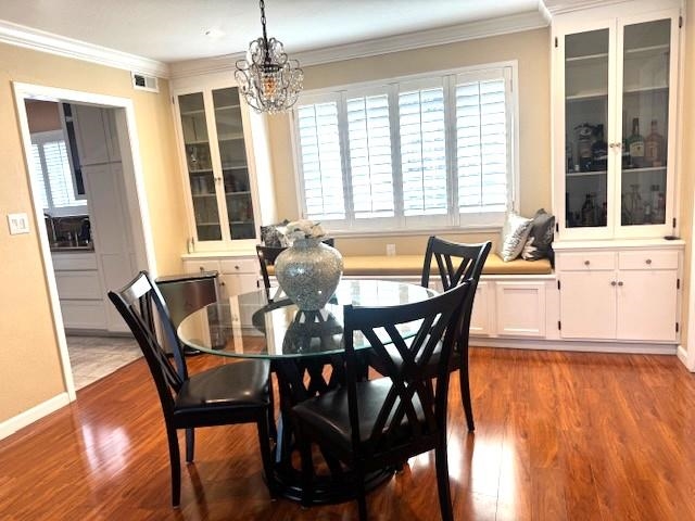 4223 Ridge Drive Pittsburg, CA 94565 - Photo 4 of 14 a dining room with furniture window wooden floor and a chandelier