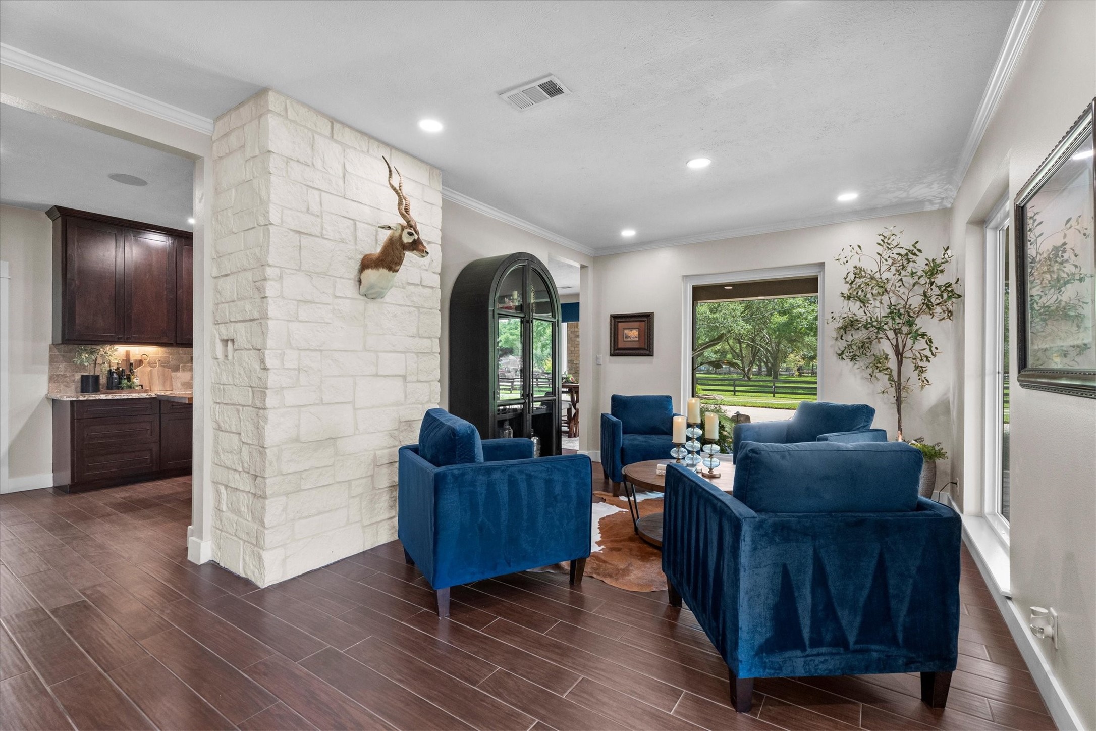 18003 Kitzman Road Cypress, TX 77429 - Photo 17 of 48 The formal dining with stone wall is being used as a sitting area